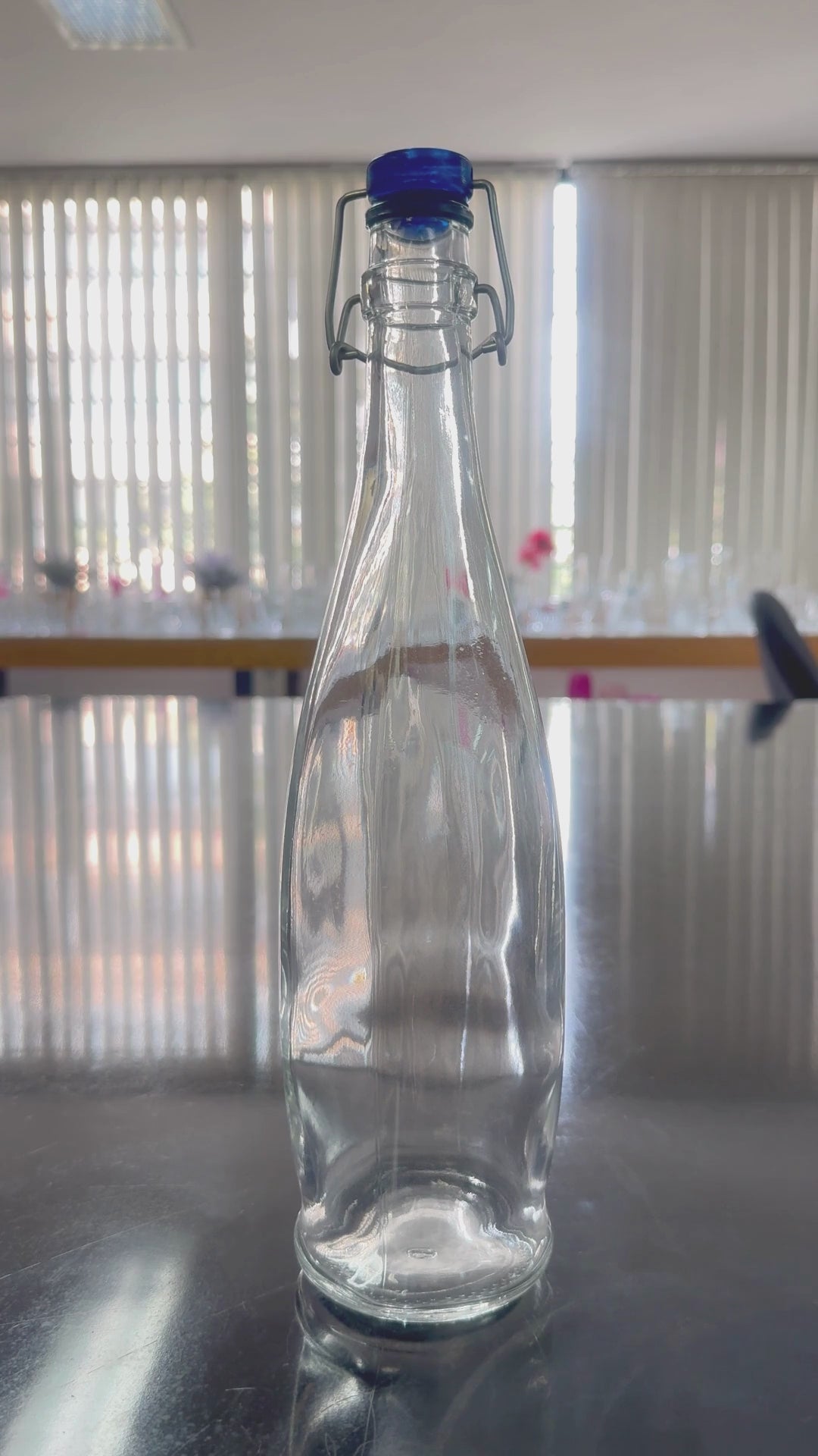 Cargar vídeo: video de presentacion de botella de vidrio hermetico