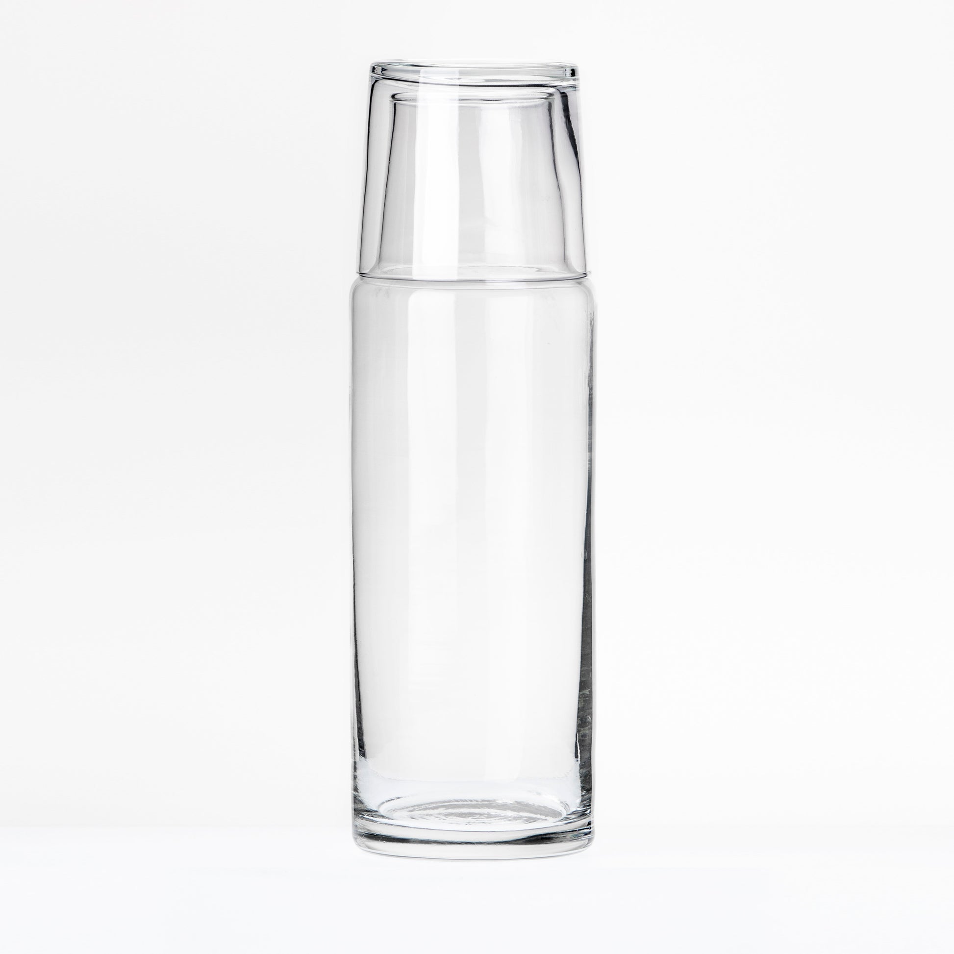 botella de vidrio con vaso de tapa para uso en la noche