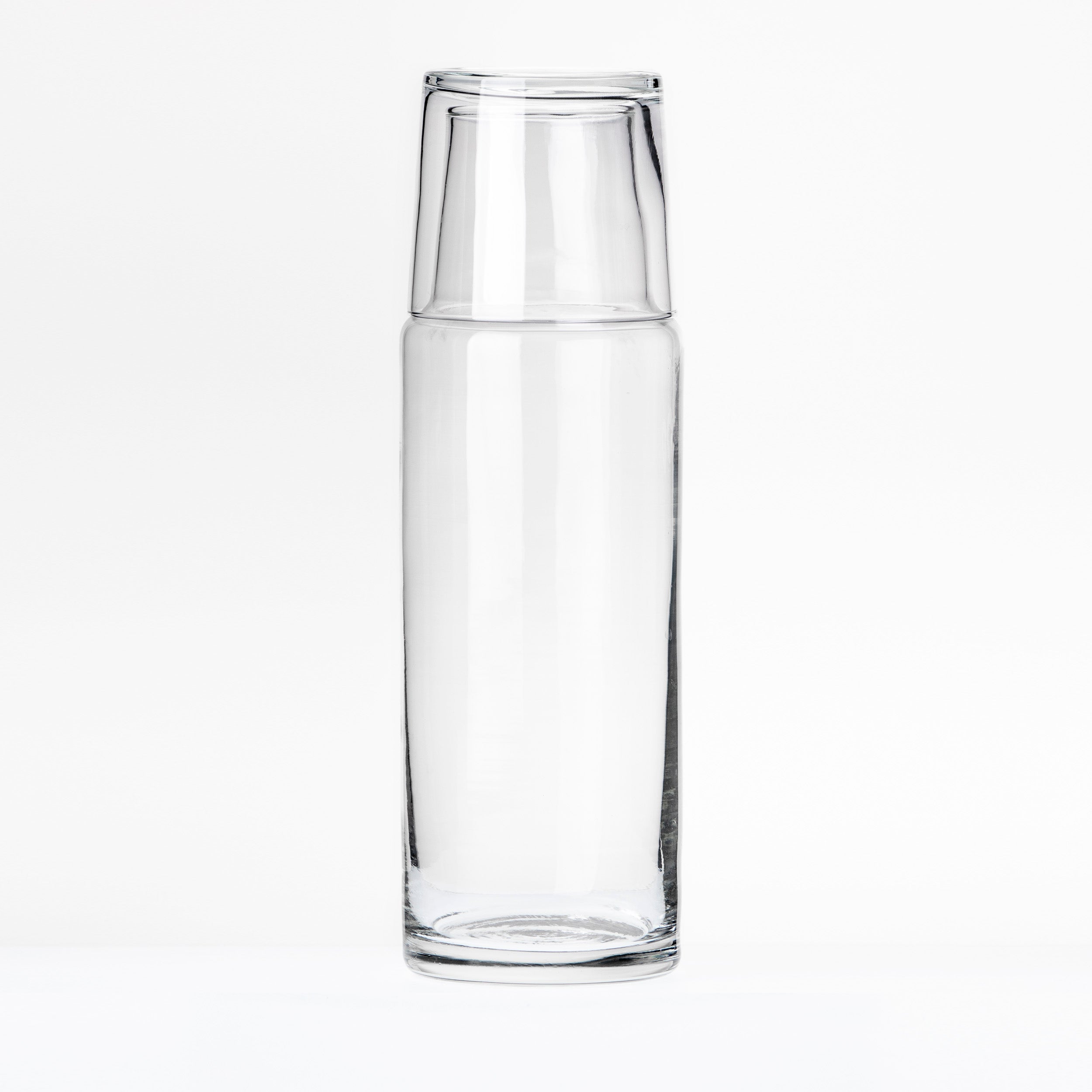 botella de vidrio con vaso de tapa para uso en la noche